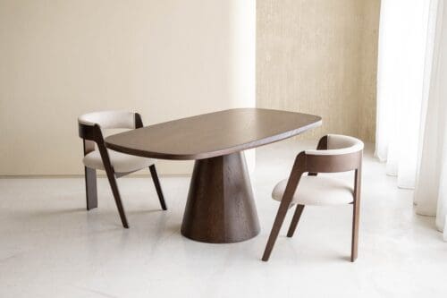 Japandi Dining Table Rosa with a walnut-colored wooden finish in a minimalist Japandi and Scandinavian interior. 180x100 cm